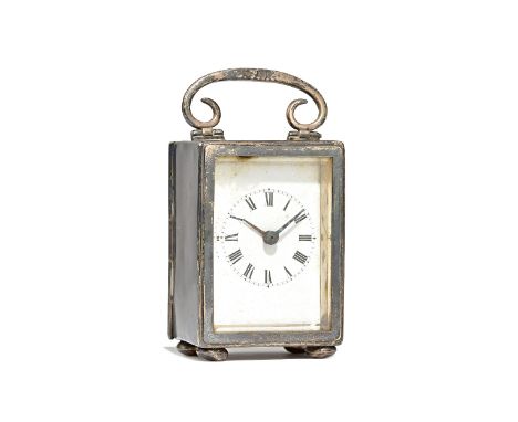 A rectangular silver cased carriage clock, having a French keyless wind movement, the enamelled dial with black Roman numeral