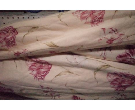 A pair of lined and interlined floral curtains, 150cm wide x 148cm drop. 