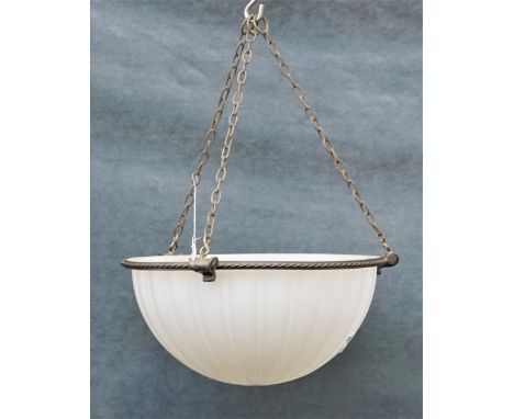 An opaque glass circular ceiling light, mid-20th century, of dished form with brass ropetwist mount, suspended by three linke