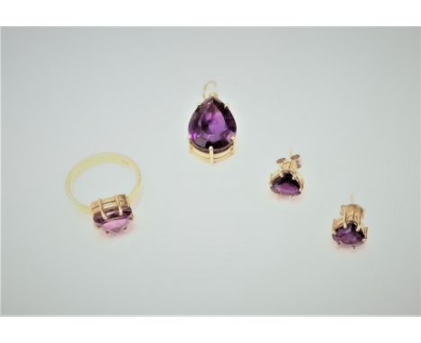 A gold ring, claw set with a curved triangular amethyst, detailed 750, ring size K, a pair of gold and amethyst set single st