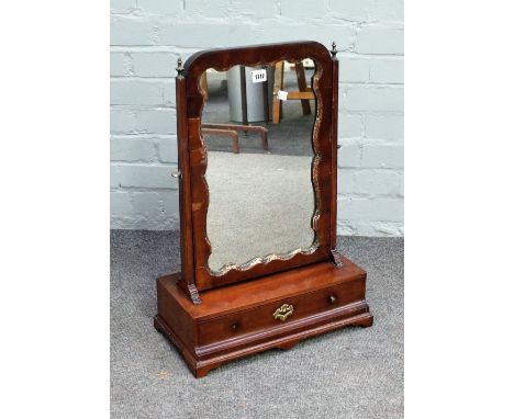 A mid-18th century swing frame toilet mirror, with cushion single drawer base, on bracket feet, 44cm wide x 62cm high.