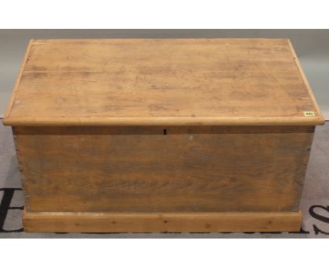 An early 20th century pine trunk, 96cm wide x 47cm high, and another similar smaller, 81cm wide x 51cm high, (2). 