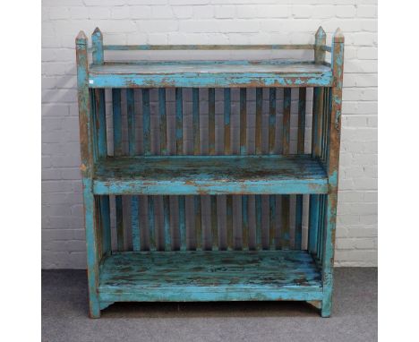 A distressed blue painted floor standing three tier shelf unit, with slatted back, 128cm wide x 151cm high. 