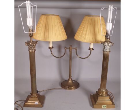 A near pair of early 20th century brass Corinthian column table lamps, 48cm high and a 20th century brass twin branch table l