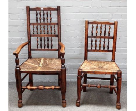 A matched set of six Lancashire oak and ash bobbin back dining chairs on turned supports, to include a pair of carvers, (6). 
