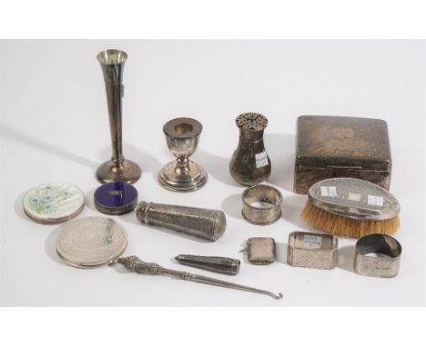 Silver and silver mounted wares, comprising; a rectangular table cigarette box, wooden lined within, a small caster, a handle