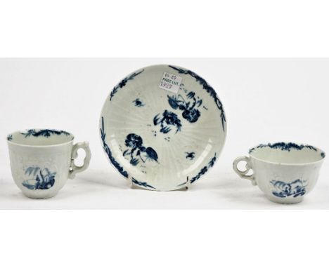 A Worcester blue and white coffee cup, teacup and saucer, circa 1756, strap fluted bodies with rococo panels, painted with `T