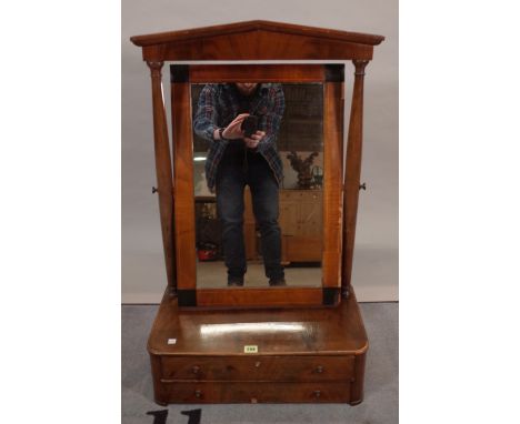 A late Victorian walnut toilet mirror with two drawer base on bracket feet, 54cm wide x 90cm high 