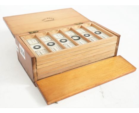 Thirty-six microscope slides, late 19th century, mainly professional mounts, botanical and zoological subjects, in an 'R &amp