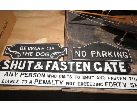 4 Reproduction wall mounted iron signs including (QHIZDHBG186)" Shut and fasten gate ",(QHIZDHBG25) " No Parking" , (QHIHS026