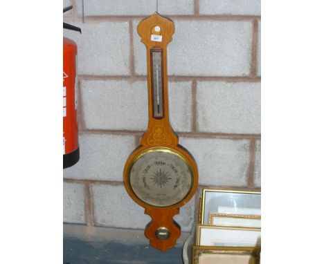 A 19th century inlaid wheel barometer ( lacking glass ) 