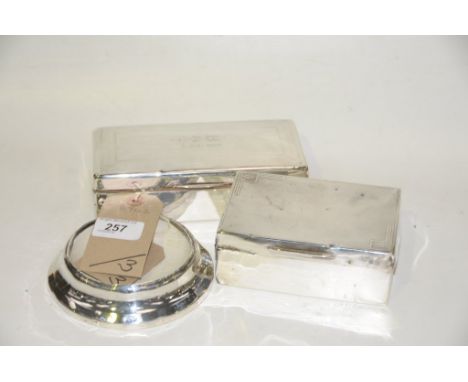 An Engine turned rectangular silver cigarette box and a second silver cigarette box, Birmingham and a silver mounted ceramic 