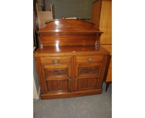 A Victorian walnut chiffonier side board , the raised back with a single shelf above a rectangular moulded top, two frieze dr