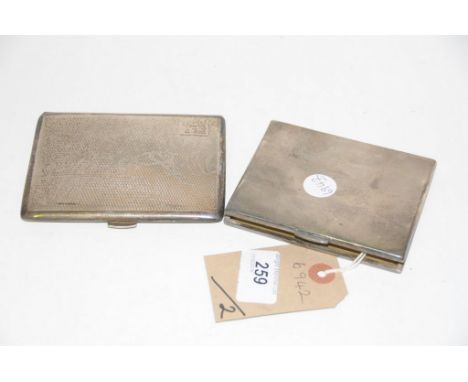 Two Engine turned silver cigarette cases, Birmingham 1920 and 1933.