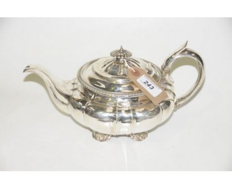 A George IV silver teapot, possibly by John Harris, London 1827 Of squat melon form, with an applied gadrooned rim to a domed