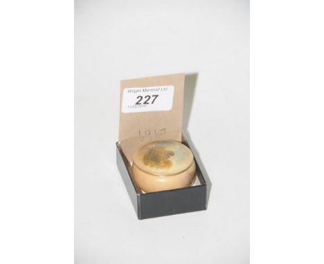 A Miniature Royal Worcester blush ivory " landscape " pot and cover.