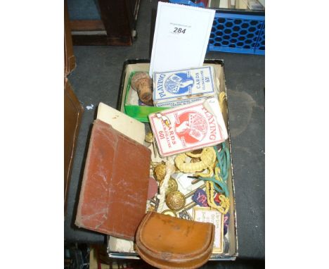 Packs of playing cards, brass military tunic buttons, lighters , qty.