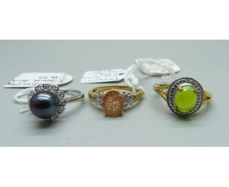 Three 925 sterling silver rings, set with diamonds, tanzan sunstone, Tahitian pearl and green Ethiopian opal, all size O 