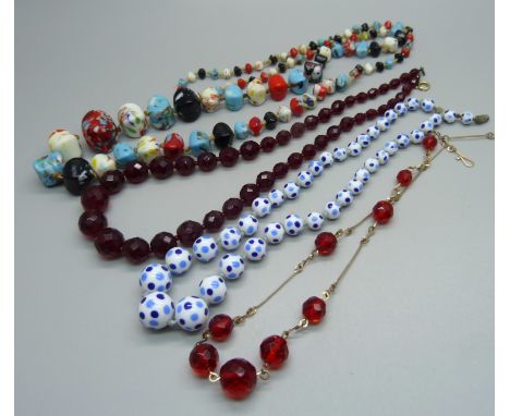 Four vintage glass bead necklaces 