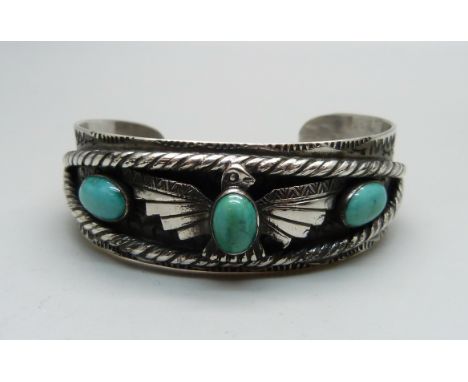 A Egyptian-style turquoise set bangle 