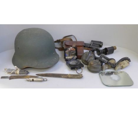 Military items with helmet, monoculars, compass, etc. 