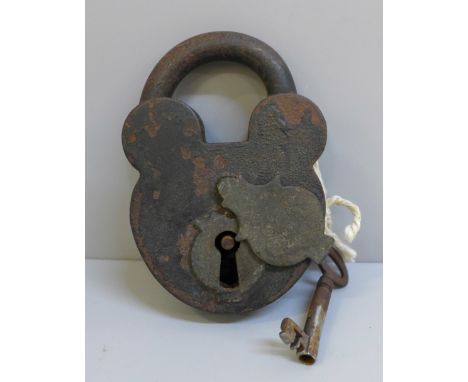 A vintage padlock with key 