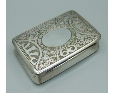 A white metal snuff box with gilt interior, continental marks, 77g, 73mm wide 