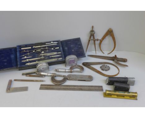 Two Moore &amp; Wright micrometers, drawing tools, two tape measures, etc. 