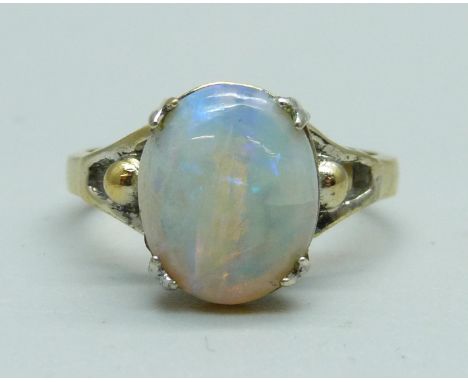 A sterling silver gilt and opal ring, M 