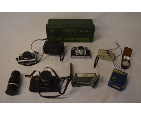Camera equipment including camera bodies, lenses, light meters, flashes etc