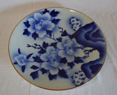 Large ceramic charger with floral pattern