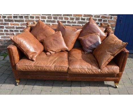 Duresta leather knoll sofa with scatter back cushions on brass castors width 184cm