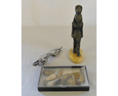 Arrow heads, leaping Jaguar car mascot & Egyptian statue