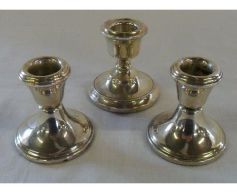 Pair of silver candlesticks Birmingham Maker Broadway & Co & 1 single candlestick Birmingham Maker A T Cannon Ltd total weigh
