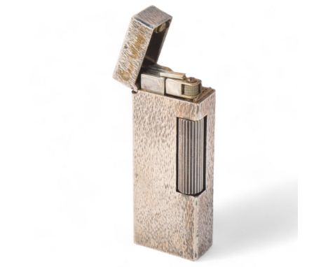 A vintage Dunhill Rollagas lighter, with textured body
Gilding has worn off, untested, no flint