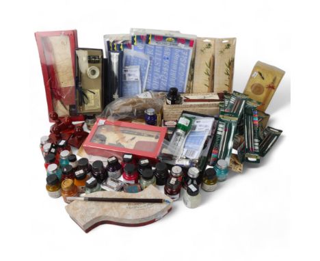 A box of calligraphy equipment, including pen set, coloured inks, stencils, ink blotters etc
All unused