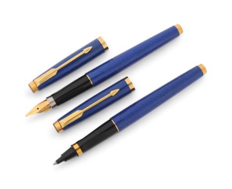 A Parker 75 Lapis Blue Laque fountain pen and roller ball pen set, 18k gold nib, in original box.
Good untested condition, ro