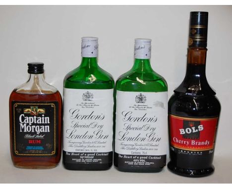 Gordon's Special Dry London  Gin, 75cl, 40%, two bottles; Captain Morgan Rum, one half bottle; and Bols Cherry Brandy, 70cl, 