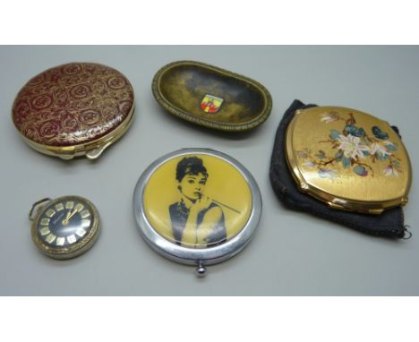 A set of two Stratton compacts and one other, a lady's pendant watch and brass tray