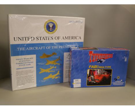 A Minicraft United States of America Aircraft of the Presidency model kit set and an Imai Thunderbirds FAB 1 Real Type model 