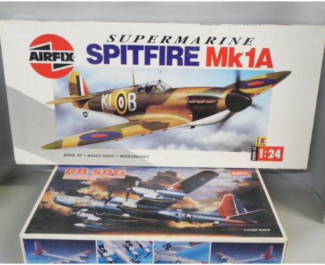 An Airfix 1:24 Supermarine Spitfire MK1A and an Academy RB-50G Electronic Reconnaissance Super-Fortress 