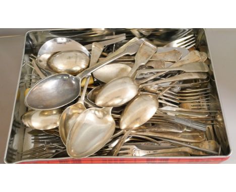 A tin of plated cutlery and a tin of model vehicles and model rail figures and vehicles 