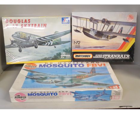 Three vintage model kits, Italeri Douglas C-47 Skytrain (sealed), Matchbox Supermarine Stranrear and Airfix De Havilland Mosq