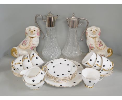A tea service, two claret jugs and a pair of Staffordshire style dogs **PLEASE NOTE THIS LOT IS NOT ELIGIBLE FOR IN-HOUSE POS