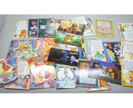 Vintage Topps Pokémon cards including First Edition blue logo 