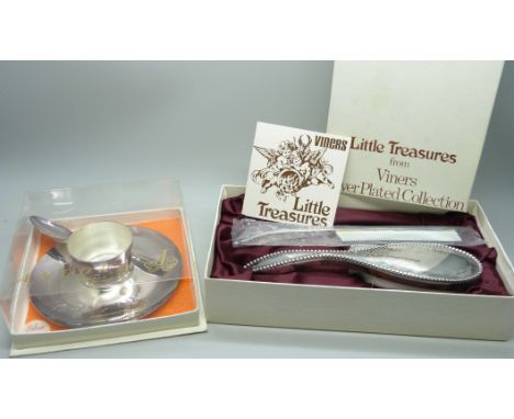 A Viners 'Little Treasures' silver plate brush and comb set with silver plated egg cup and spoon, boxed sets