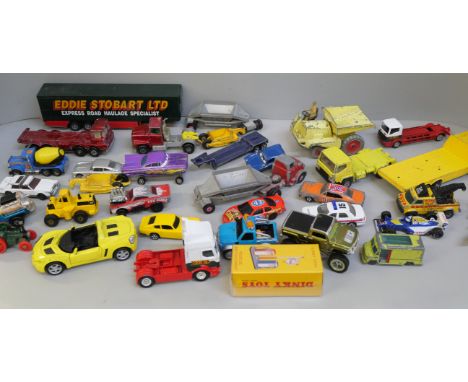 Two boxes of die cast model vehicles including Welly and Matchbox 