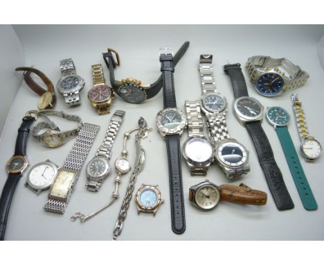 A collection of lady's and gentleman's wristwatches; Boss, Fossil, Citizen, Nautica, etc.