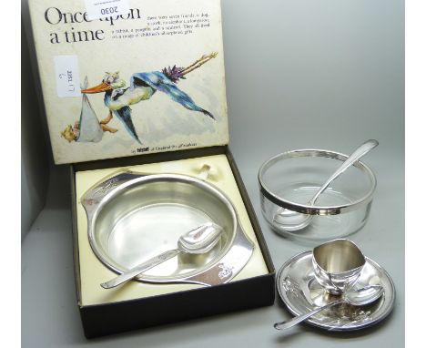 A 'Once Upon A Time' boxed silver plated bowl and spoon set and EP silver egg cup and spoon and EP silver rimmed glass bowl a