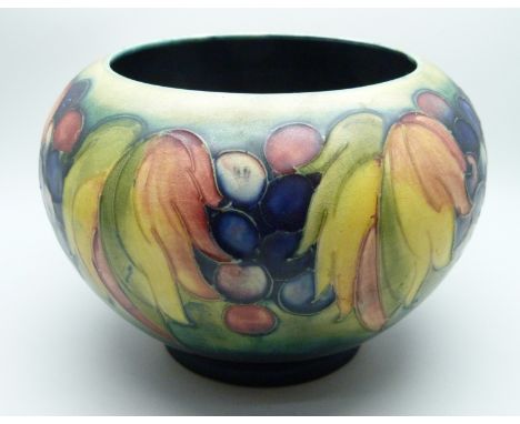 An early 20th century Moorcroft Leaf and Berries pattern planter, 11cm